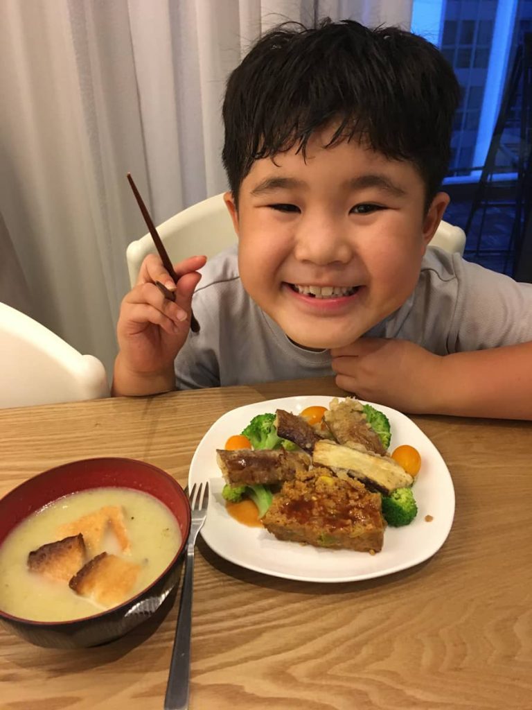 Ryugo showcasing brinjal tempura creation
