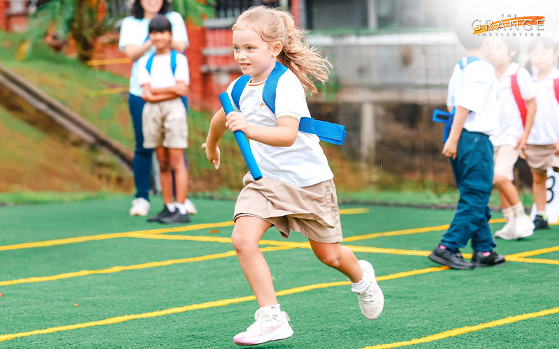 Student running in a race at an international school.